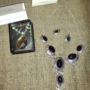 Three new in boxes Avon necklaces